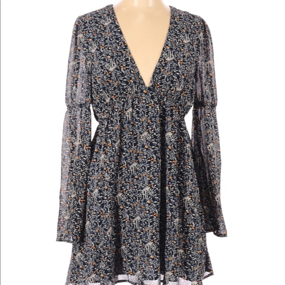Lucca Couture dress with plunge neckline